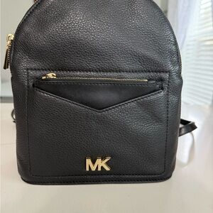 Michael Kors Black Pebbled Leather Mini Backpack with Gold MK Emblem